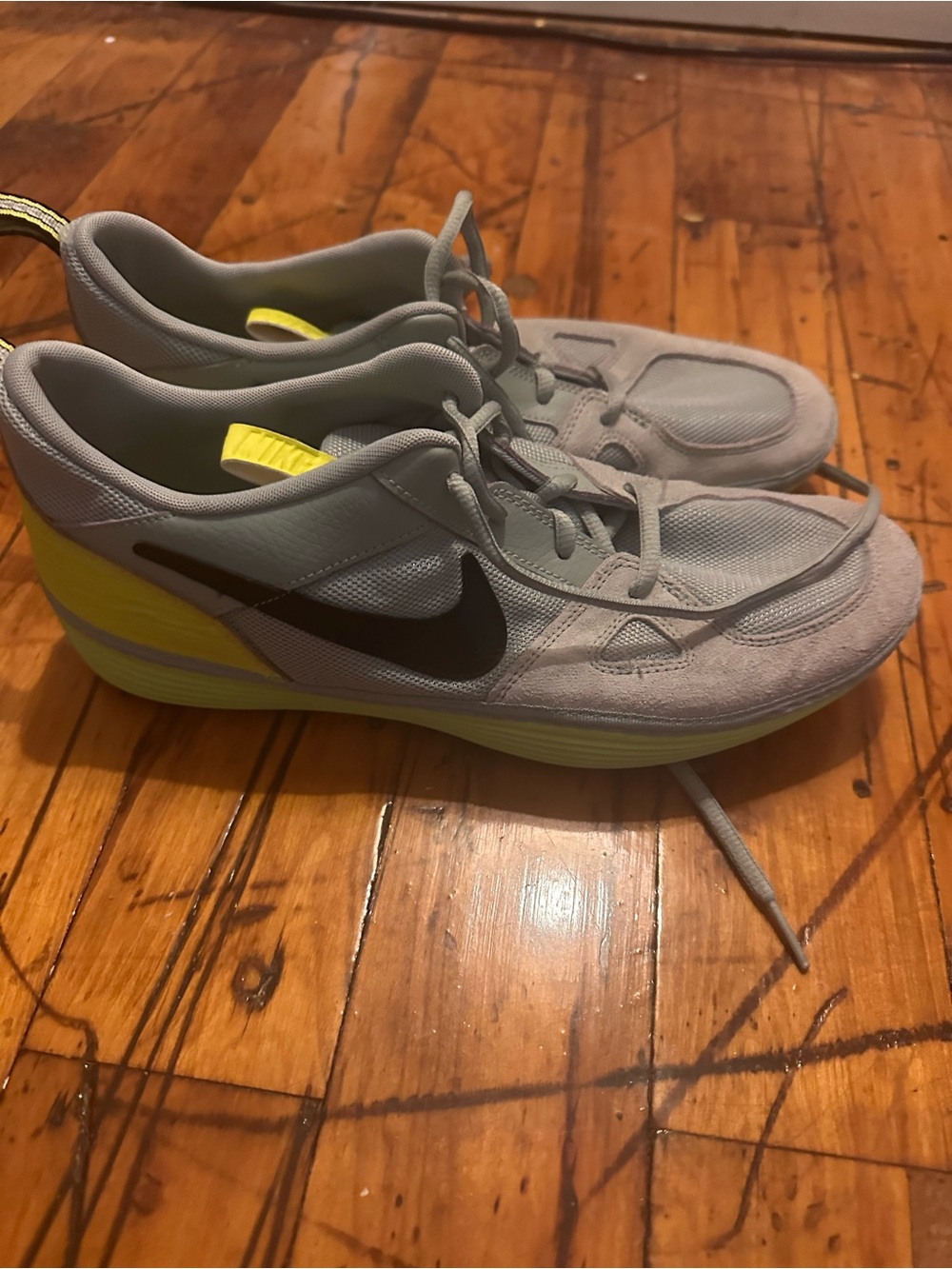 Nike Men’s Grey & Yellow Running Shoes with suede accents